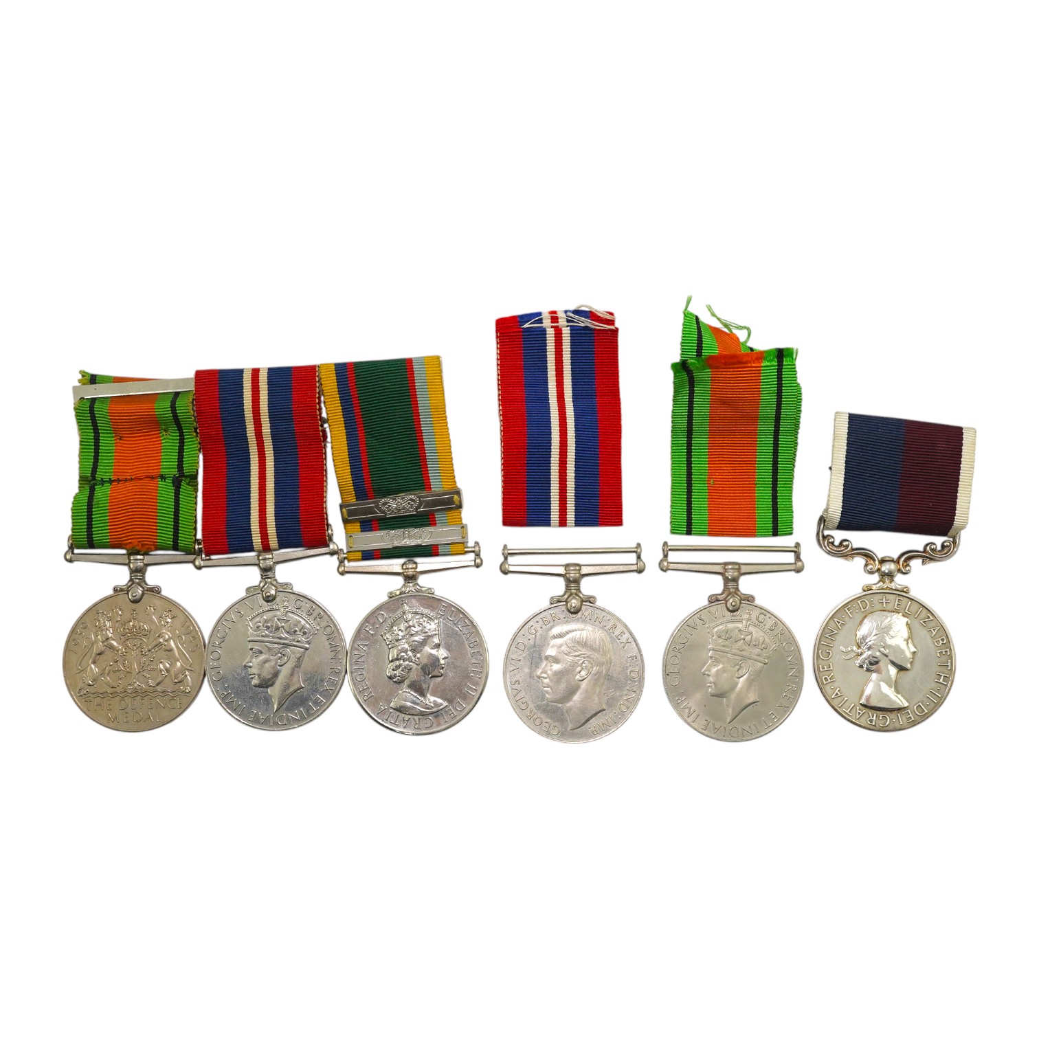 A group of assorted medals; WW2/ERII Cadet Forces medal group of 3 with two clasps to Fg.Off.W.K.Winstone R.A.F.V.R.(T); ERII RAFLSGC to Cpl B.K.Stockwell (F2570477) in box; WW2 Dm & WM. Condition - fair to good.